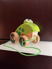 Hape Frog Pull-Along Wooden Frog Fly Eating Pull Toddler Toy, Bright Colors