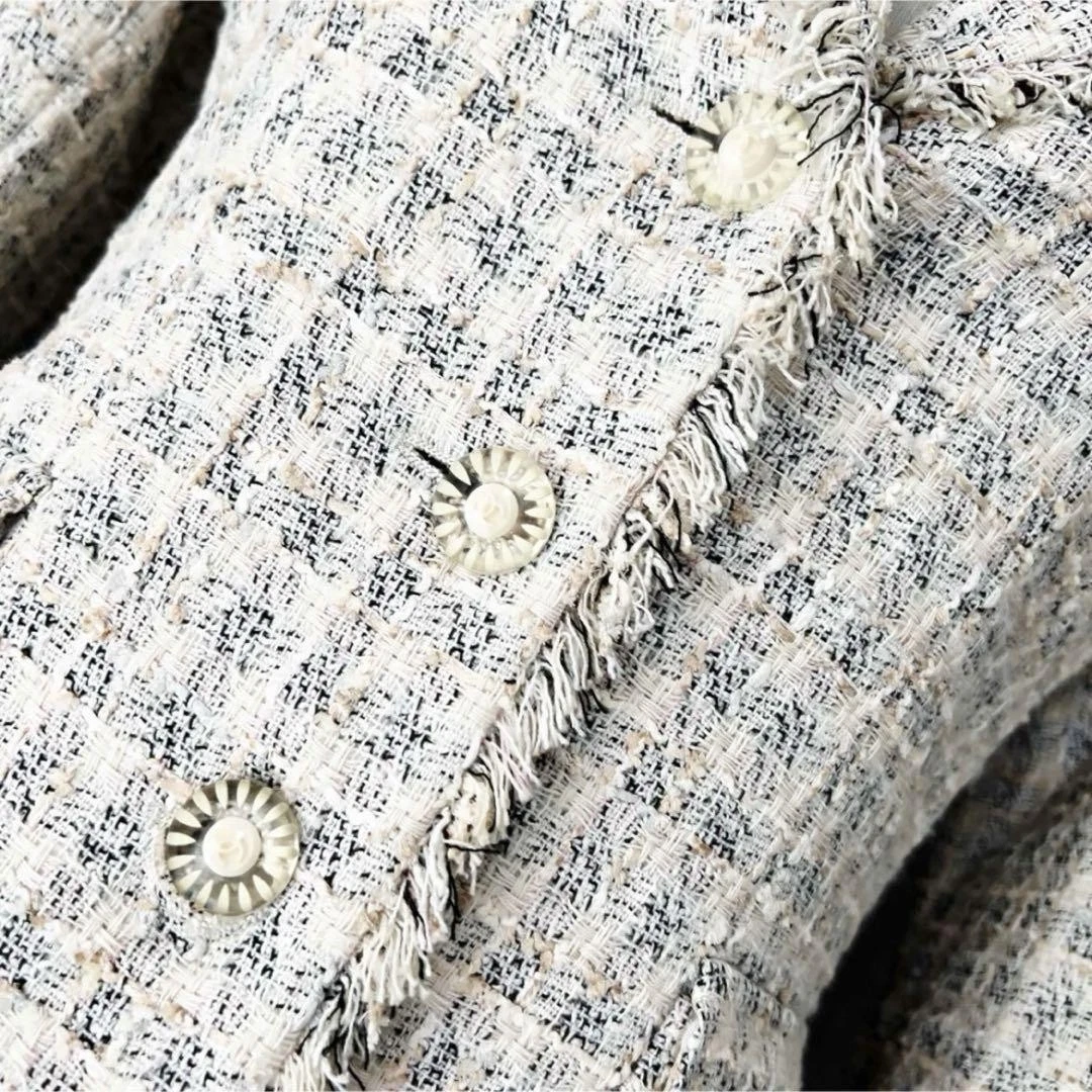 Giacca Chanel Gripore tweed pastello con cura