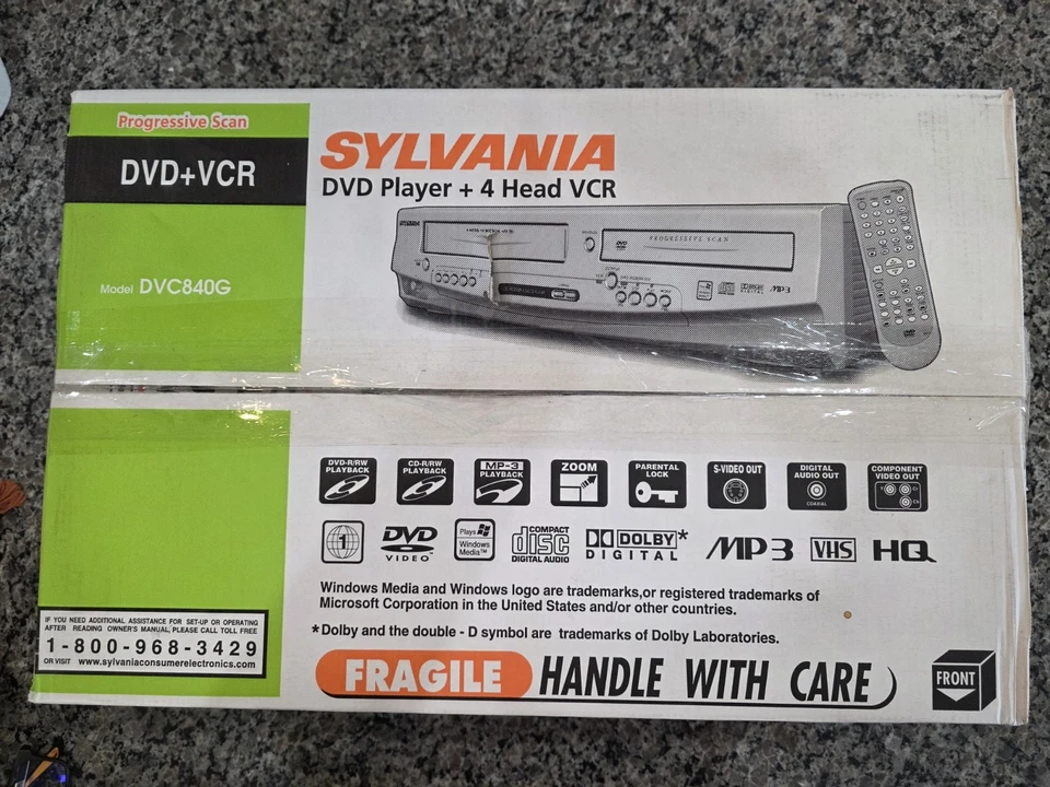 SYLVANIA DVC840G Reproductor de DVD VCR Combo 4 Cabezales HQ Grabadora VHS NUEVO Caja Abierta Plateado Foto 4 de 4