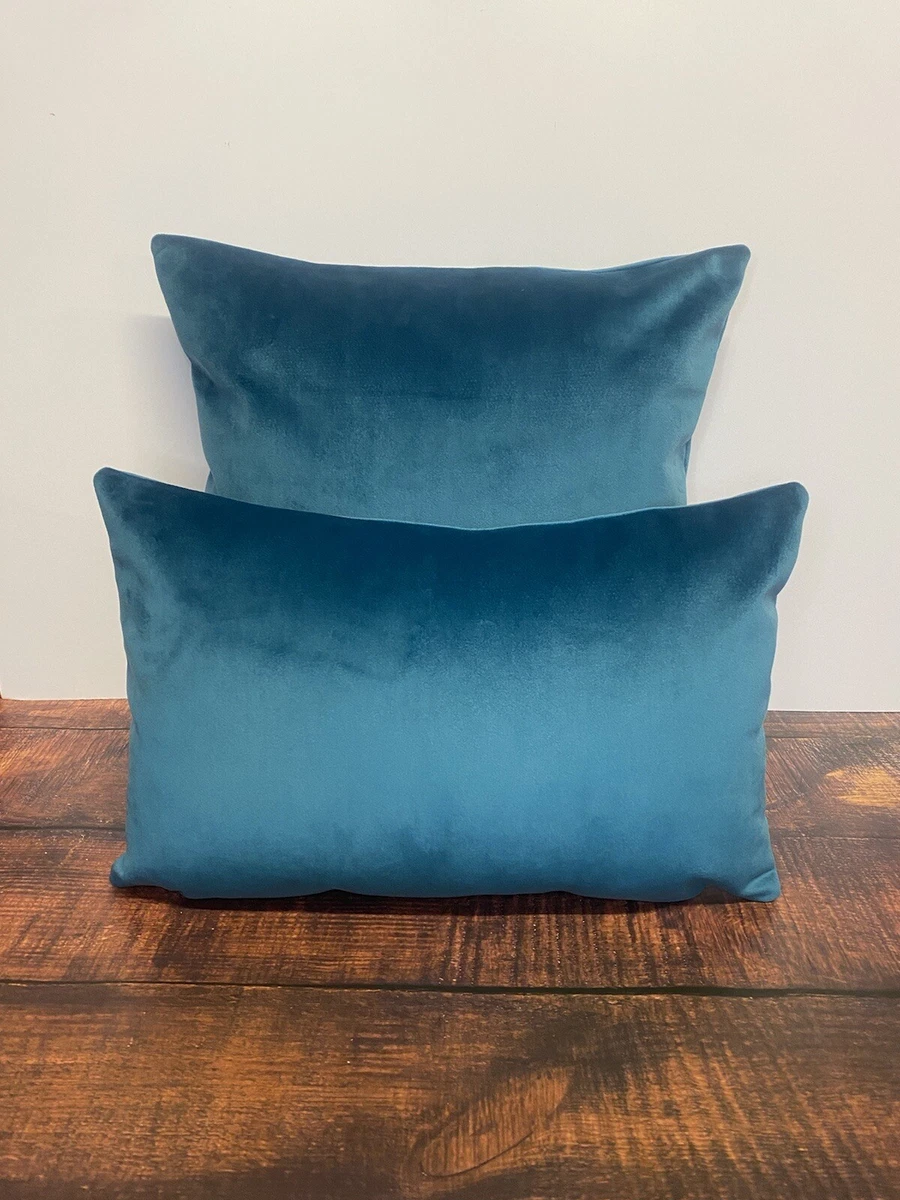 Teal blue store velvet cushions