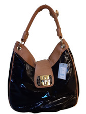 Black patent leather handbag with brown leather details made in USA Marc Fisher
