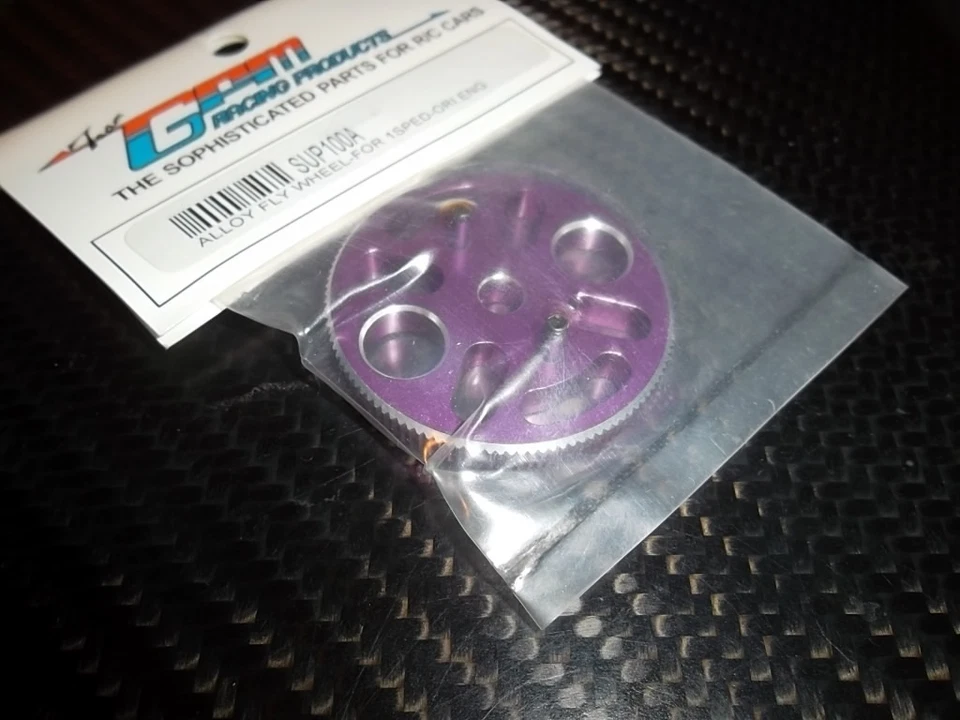 GPM SUP100A volant alu 2 pts "violet" moteur KYOSHO .11 & .15 ( 2.1 / 2.5 ) - Photo 1/1