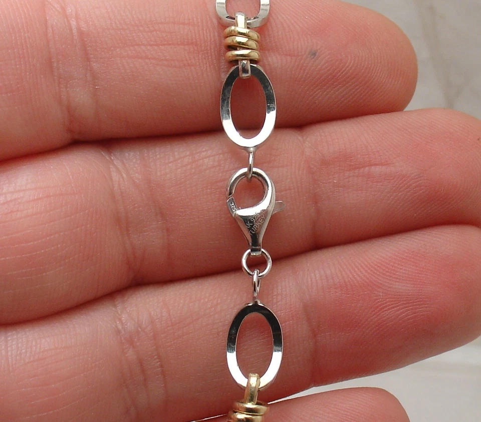 Brazalete Technibond de 8" cóncavo de eslabones ovalados enchapados en oro de 14K en dos tonos de plata 925 Foto 2 de 4