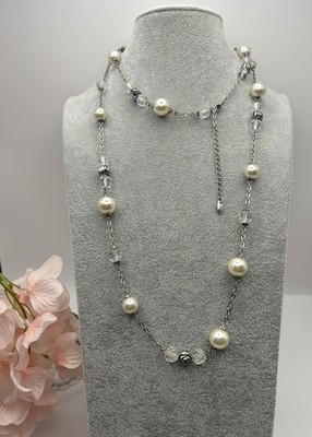 Faux pearls faceted clear ice lucite and silver roses.