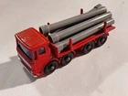Matchbox Lesney no. 10 Leyland flatbed pipe truck Red cab/chassis Gray pipes