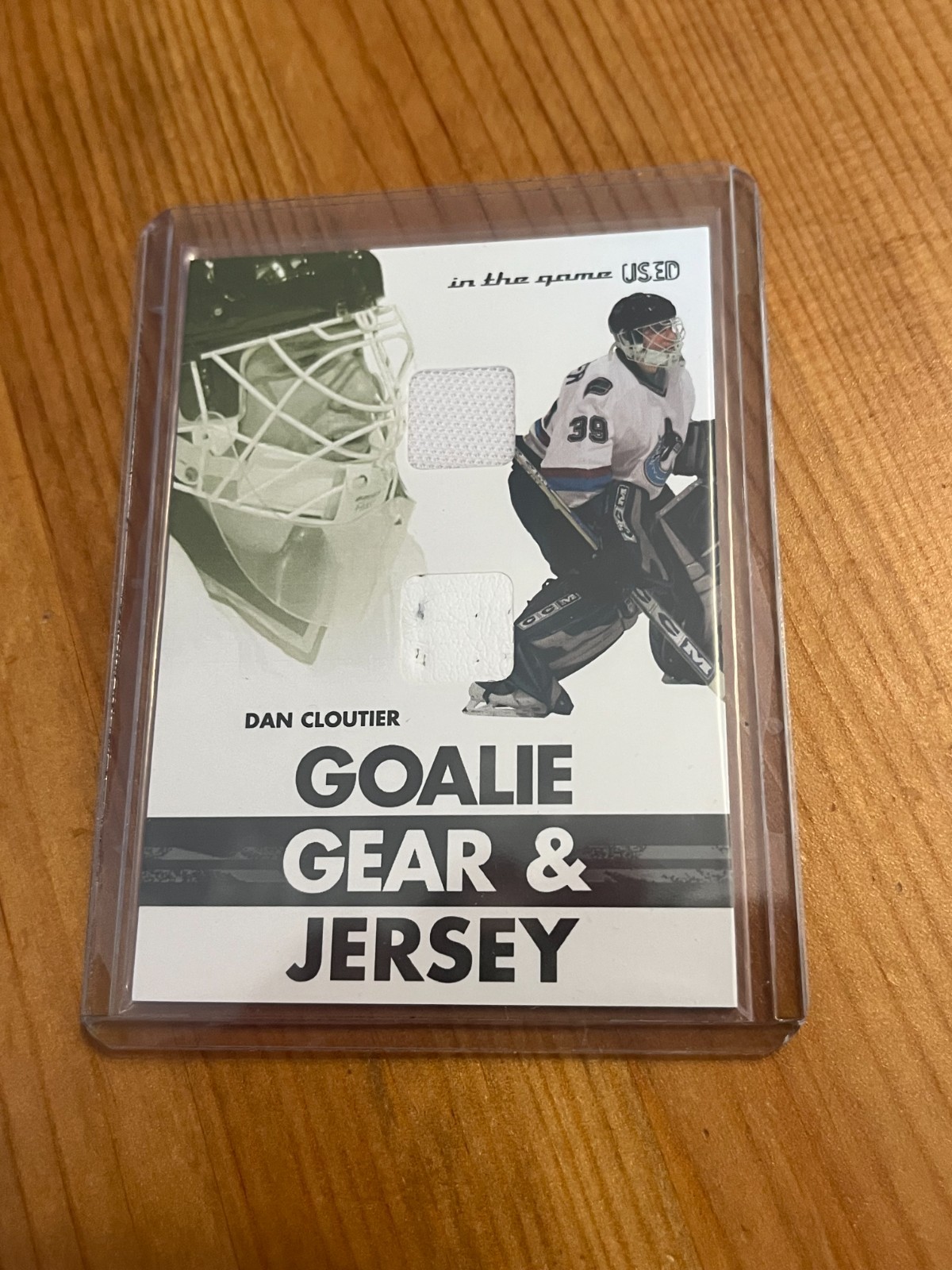 2003-04 ITG Used Signature Series Goalie Gear & Jersey #GG-27 Dan Cloutier
