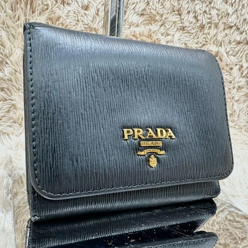Portefeuille Prada triple pli noir Vitello logo doré unisexe authentique
