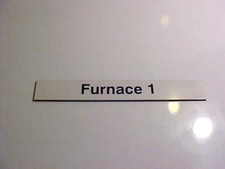 Magnetic Notice That Reads FURNACE 1 (AS)