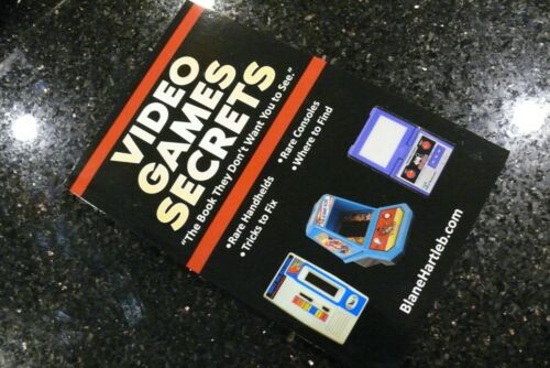 VIDEO GAME SECRETS Vintage  Handheld Electronic Arcade Tabletop game  BOOK   NEW - Photo 1/7