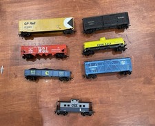 Lot of 7 HO Scale Rolling Stock Hopper Box Car Tank Car Gondola Caboose