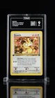 2000 POKEMON TEAM ROCKET 1ST EDITION #62/82 MEOWTH TAG 9