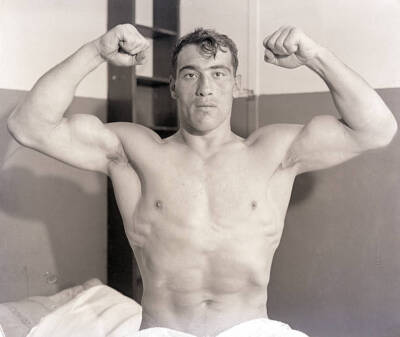 Primo Carnera Flexing Biceps 1933 Photo Pompton Lakes, NJ- If huge and powerfu