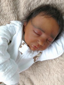 cuddle reborn baby