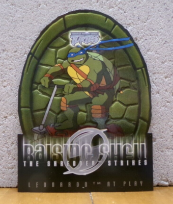 CHASE EMBOSSED TEENAGE MUTANT NINJA TURTLES TRADING CARD RAISING