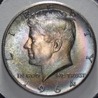 1964-P 50C Kennedy Half Dollar Toned