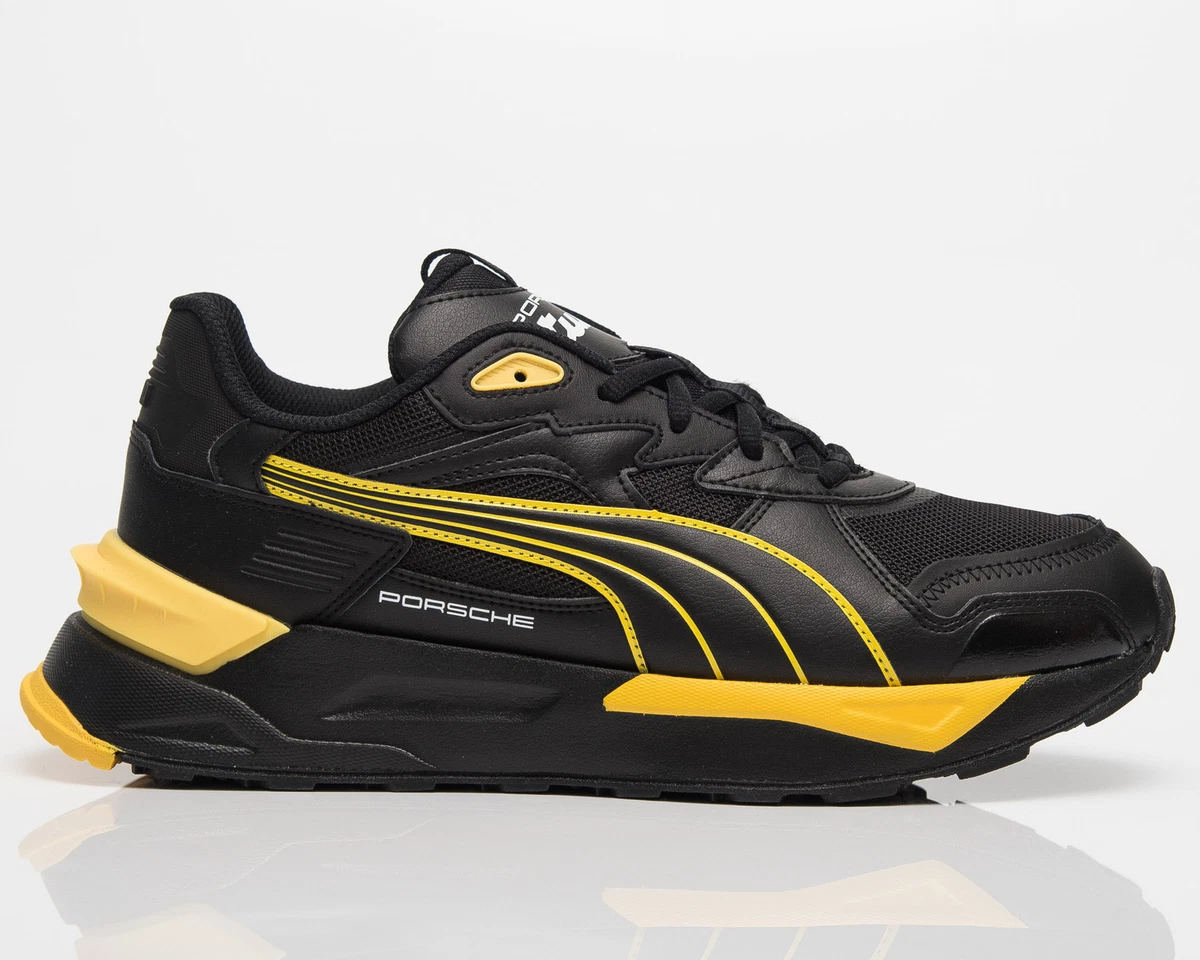Black yellow sales puma shoes