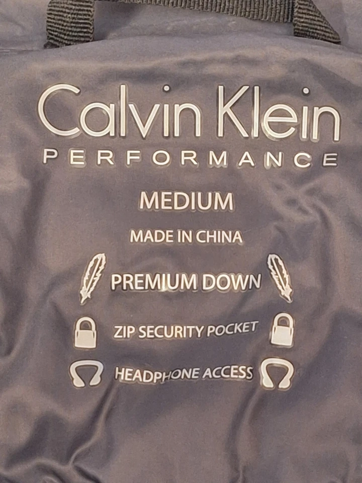 Chaleco acolchado asimétrico relleno de plumón CALVIN KLEIN Performance para mujer gris MEDIANO Foto 4 de 4