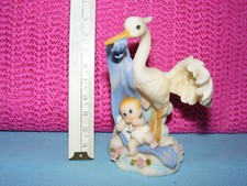 Lot de sujets COMMUNIANT,COMMUNIANTE,LAPINS en céramique,Cigogne pour naissance 