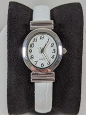 White Dial Silver Tone Oval Case Hinge Open Cuff Bracelet Band Watch