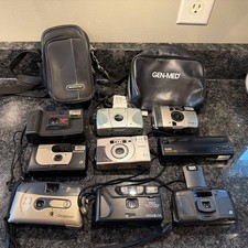 Lot Of 9 Vintage Cameras-- CANON/NIKON/KODAK AND MINOLTA UNTESTED Plus Bags