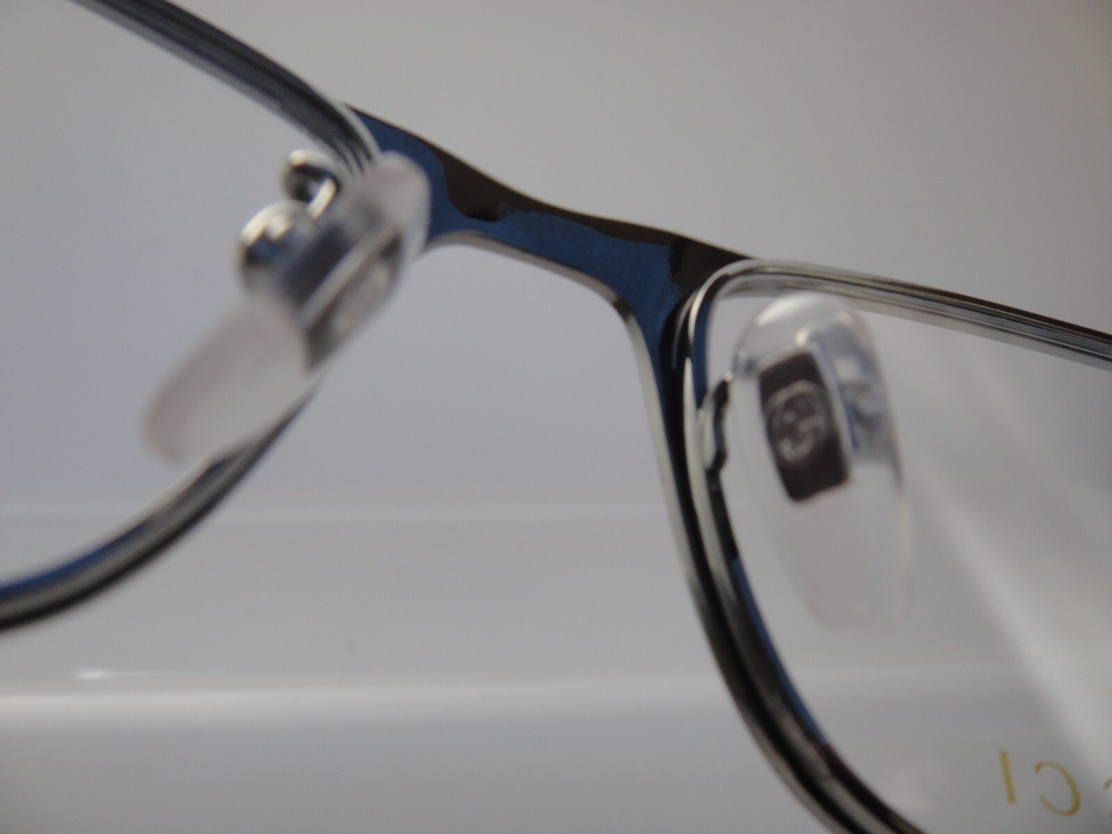 Gucci GG0133OJ 002 56 17 145, Titanium Frame in Ruthenium/Gold Eyeglasses/Case