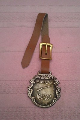 Rare Winchester Repeating Arms watch fob with raised rifle & leather strap!