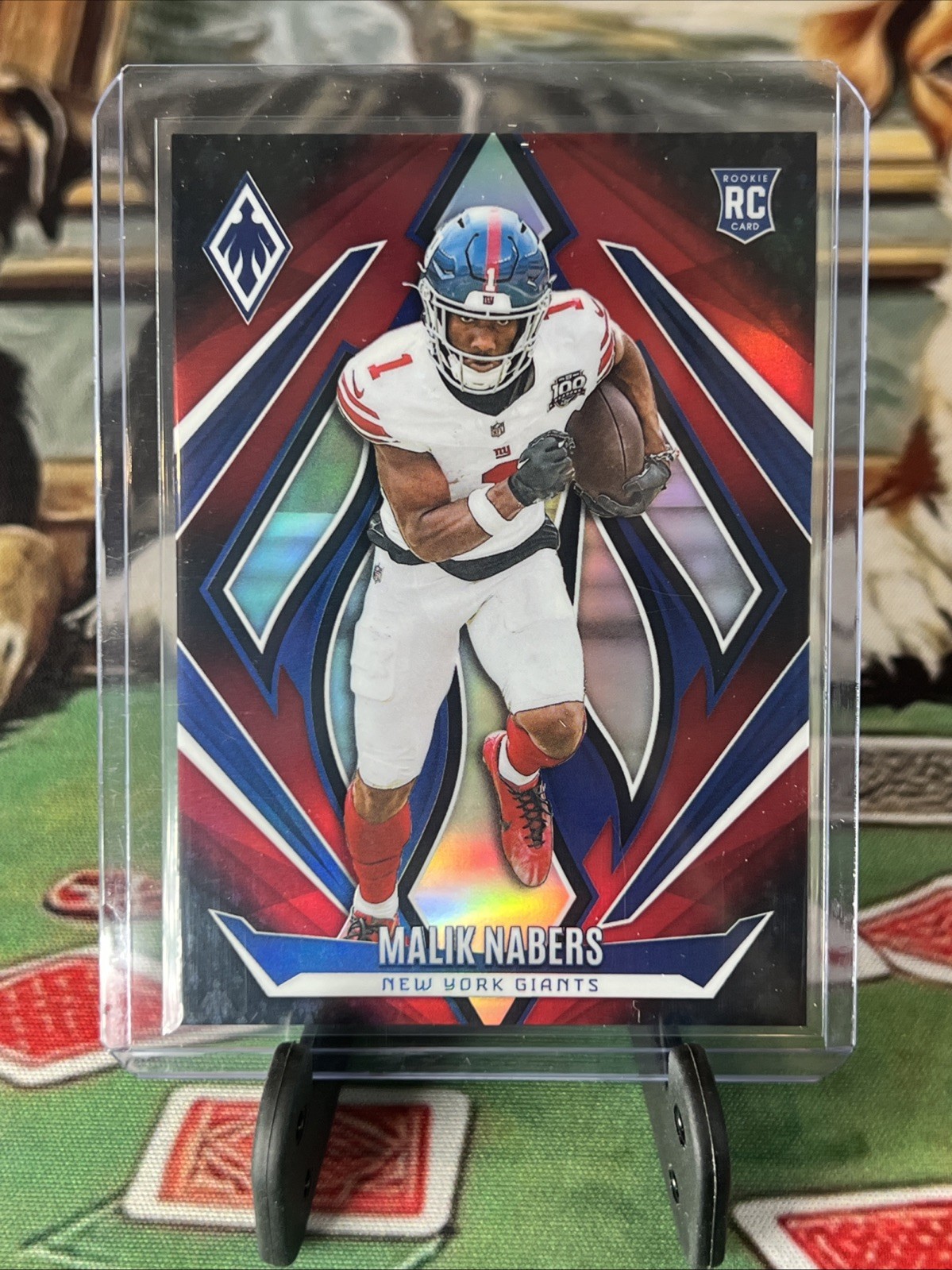 2024 Panini Phoenix - Rookies Malik Nabers #221 Red Fade /299 (RC)