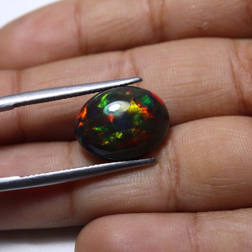 4,9 ct 15 x 11,9 mm natürlicher AAA auffälliger Multi Feuer geräuchter schwarzer äthiopischer Opal oval - Bild 6 von 10