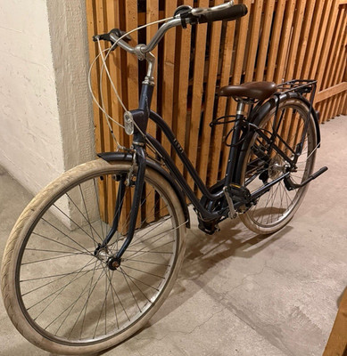 Elops City Bike Tiefeinsteiger Schwarz mit Gepäckträger und Cruiser-Lenker