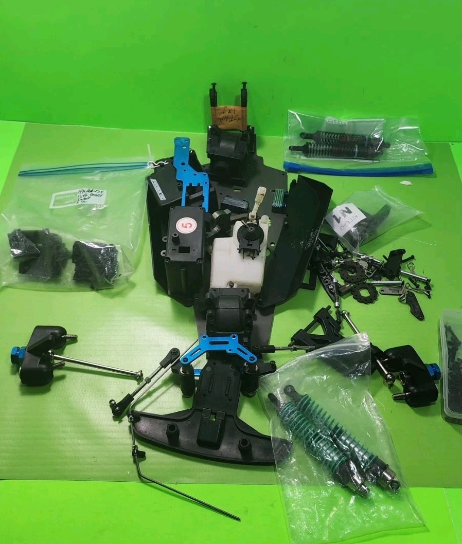 Vintg RC PART'S Lot OFNA LX1 NITRO 8TH SCALE BUGGY USED FOR PARTS