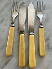 fish knives & forks 4 bone handles , used , old , very nice 