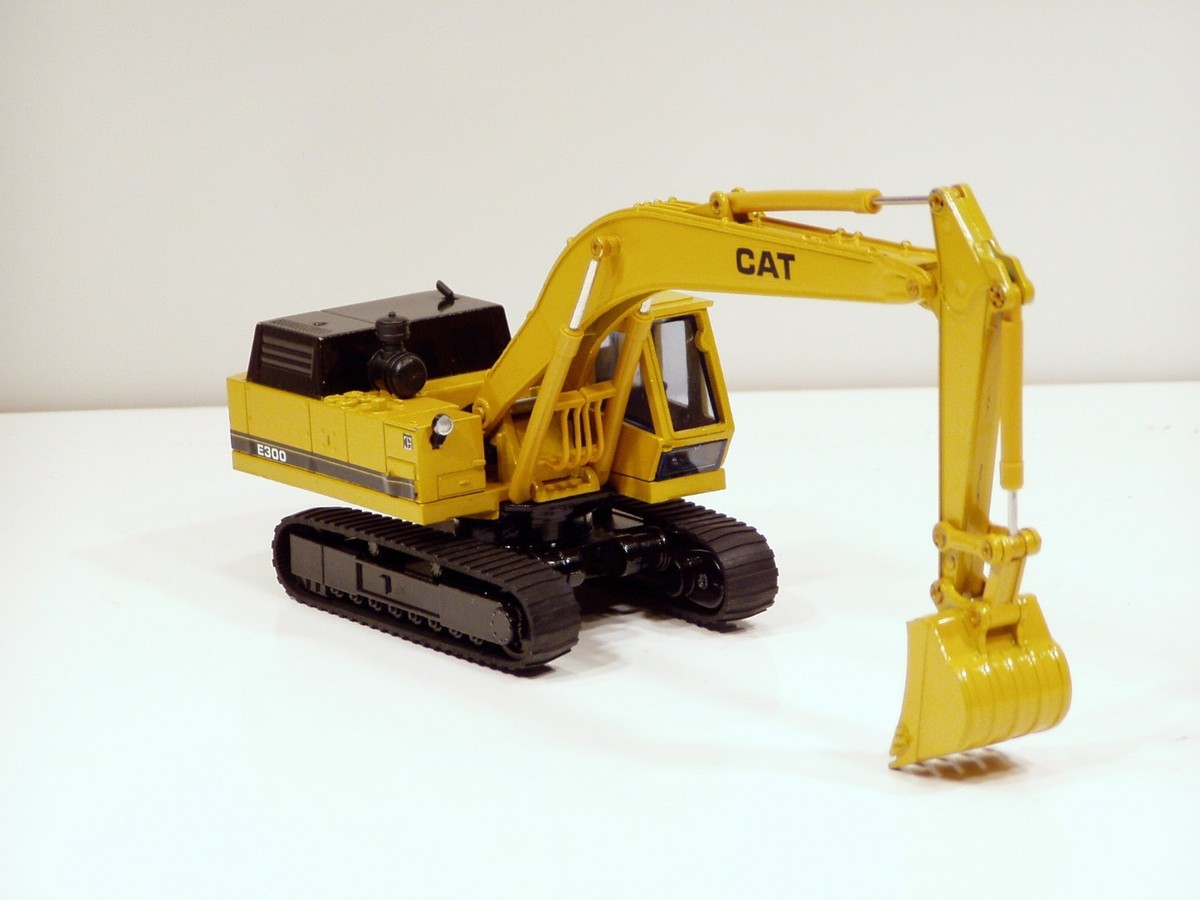 Miniature Caterpillar E300 Excavatrice Shinsei 1:48 - Pelle Moulée Sous Pression