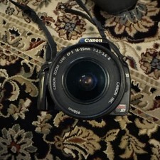 Canon EOS Rebel XT SLR Digital Camera DS126071 With Zoom ES-S