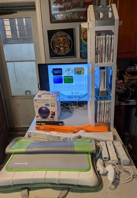 Nintendo Wii, 14 Games, 4 Controllers, Storage Tower,  Gun Controllers, Fitness