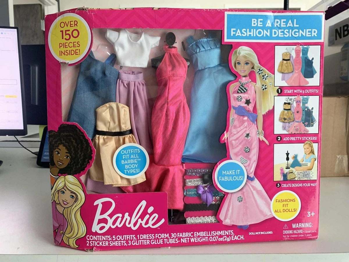 Barbie doll set of clothes. Outfit for dolls