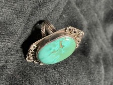 Sterling silver small ring wide oval turquoise stone w/rope circle design