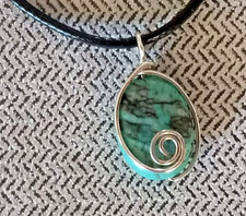Wire Wrapped Stone Pendant On Black Cord