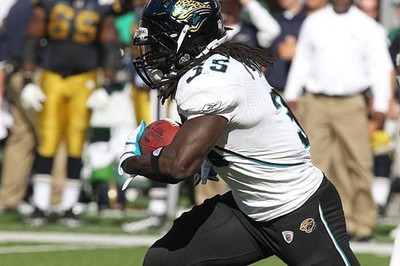 Running Back Deji Karim Jacksonville Jaguars has a long gain again- Old Photo