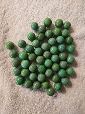 Lot of Vintage Solid Green Glass Marbles. Sizes Color Vary.