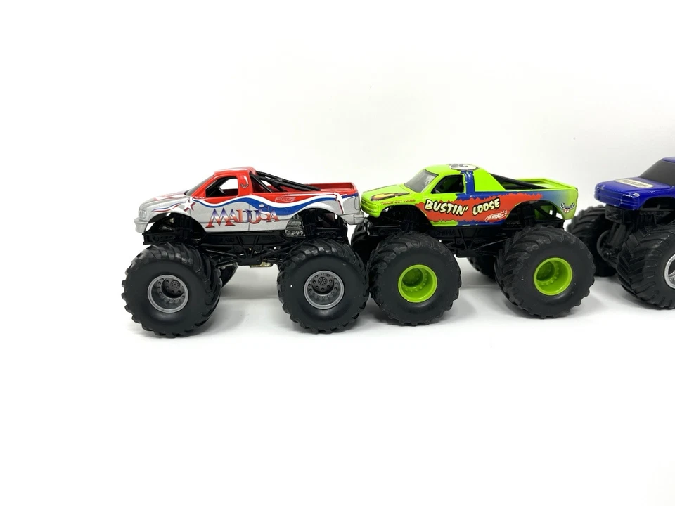 Lote de 4 Camiones Monster Jam Hot Wheels 1:64 Spiderman - Madusa - Bustin Sueltos Foto 2 de 4