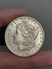 1885- O Morgan Silver Dollar AU