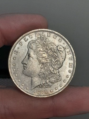 1885- O Morgan Silver Dollar AU