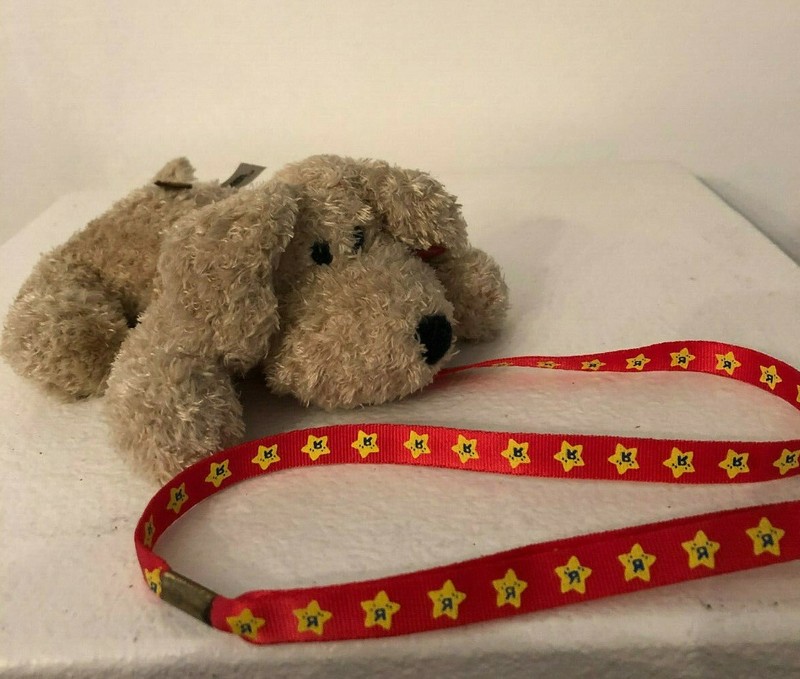 Toys "R" Us Darby the mini Dog on a ‘R’ Us Branded Leash and Tag