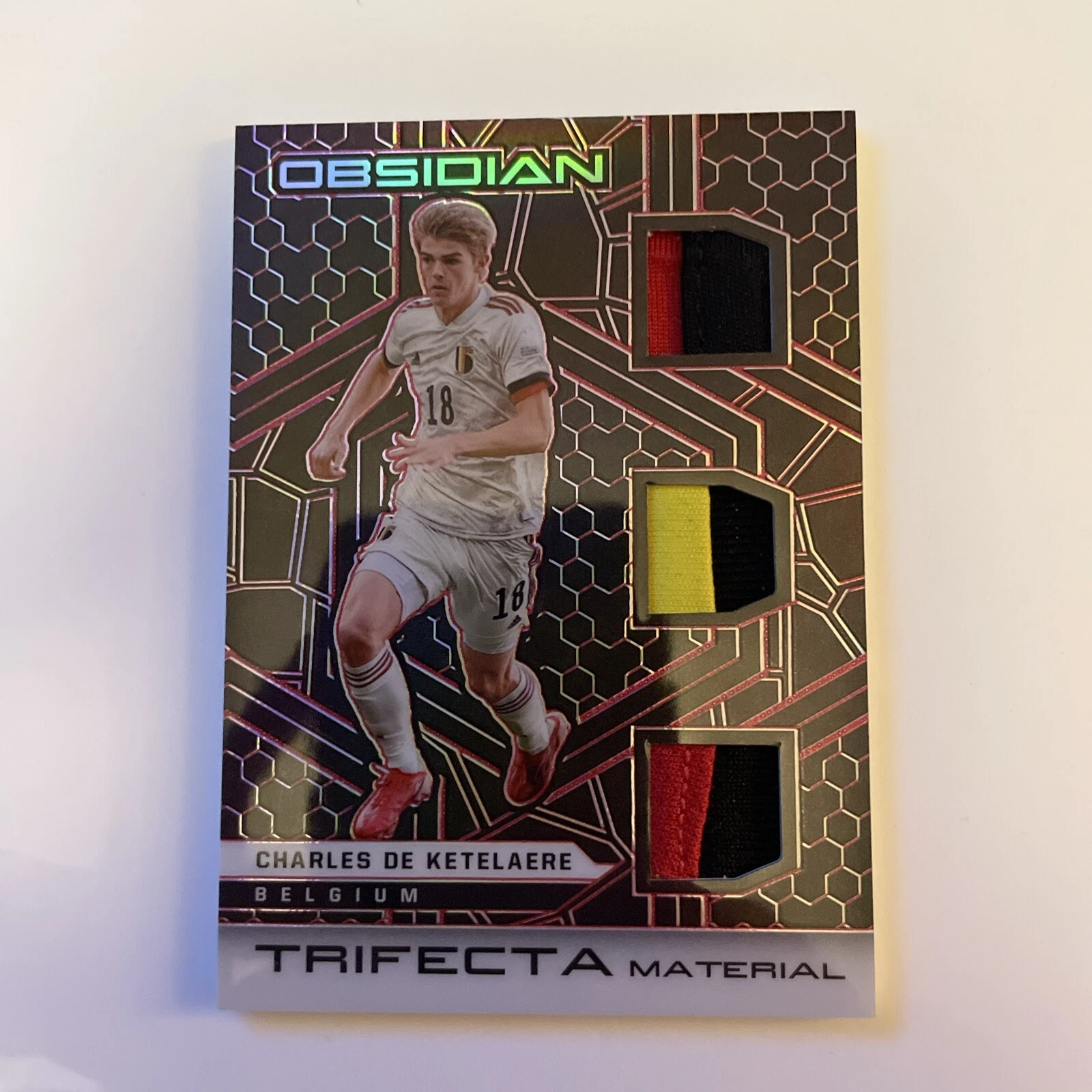 2021-22 Panini Obsidian Trifecta Material Charles de Ketelaere Red 06/25 Belgium