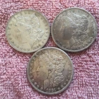 MORGAN SILVER DOLLAR COINS.  LOT OF 3   XF/AU.    PRE. 1921  LOT # 99