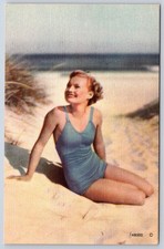 Vintage beach girl blue swimsuit blonde beauty 1940s Linen