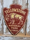VINTAGE YELLOWSTONE PORCELAIN SIGN OLD NATIONAL PARK WYOMING BISON ARROWHEAD 12"
