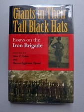 Giants in Their Tall Black Hats