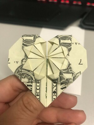 Money Origami A heart shaped origami made from a Dollar Bill