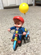 Vintage Celluloid boy on Tin Litho Bike with Ballon Made in Japan Wind Up